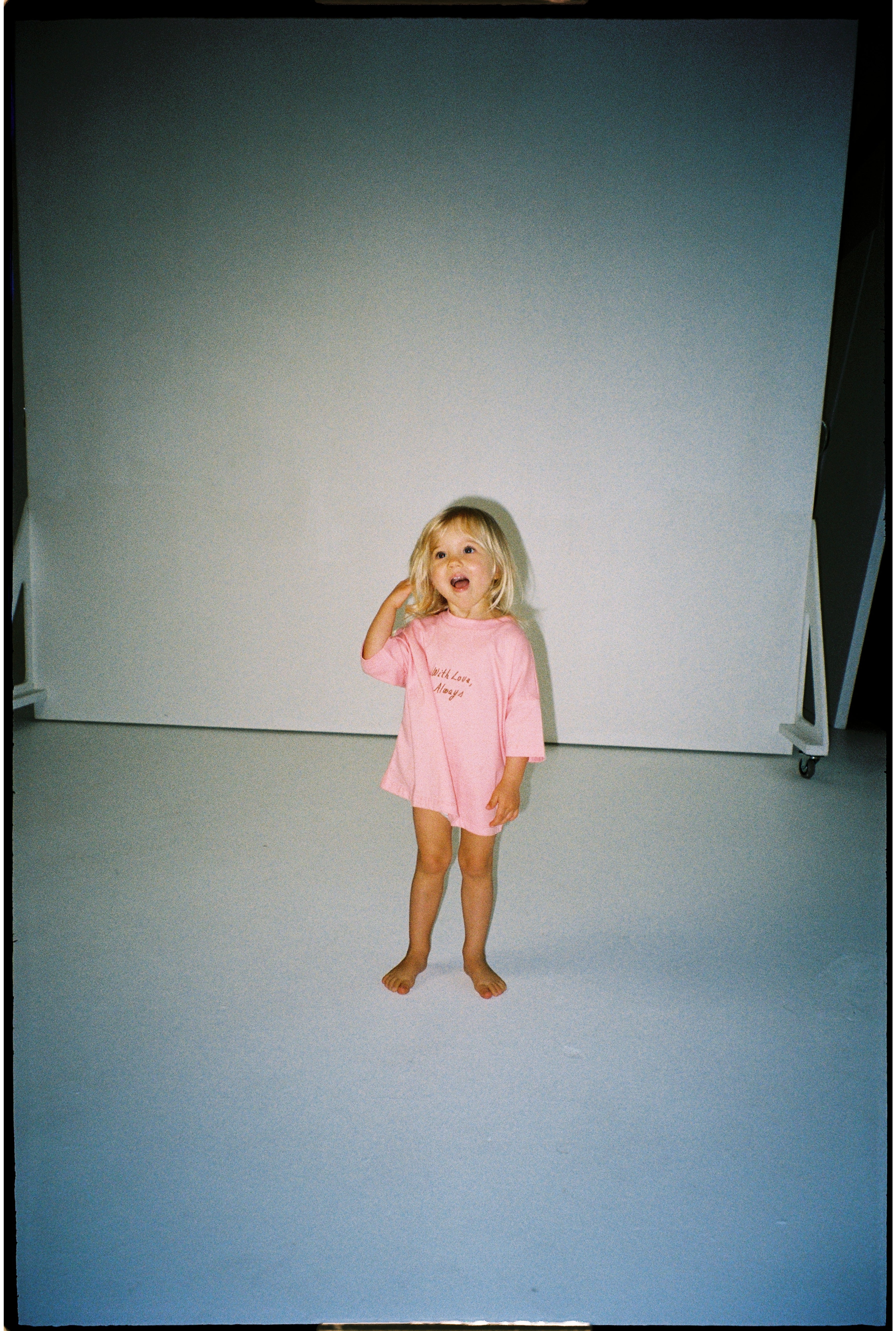 toddler girl wears oversize pink tee with chocolate embroidery and floral print bloomers