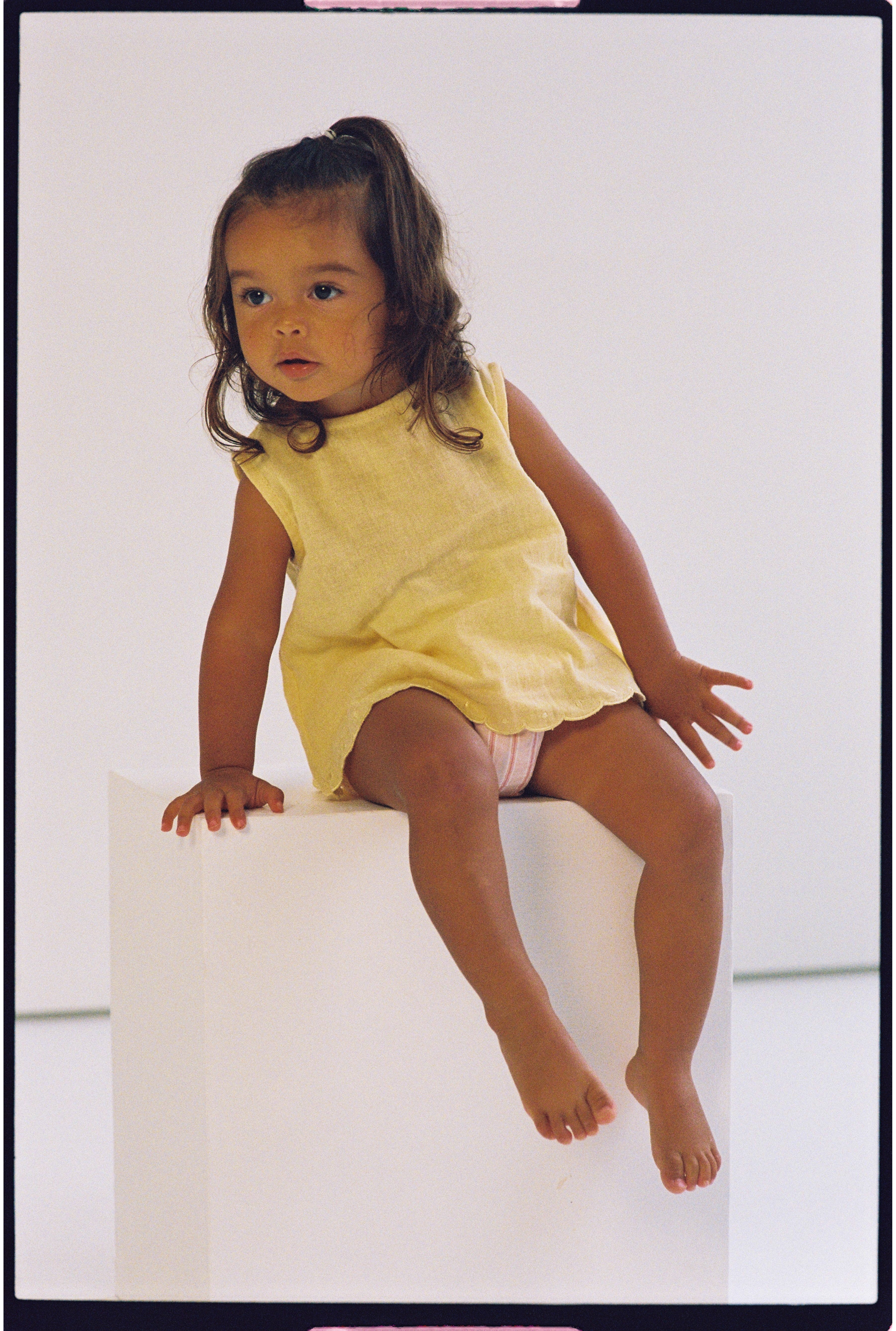 baby girls woven cotton blouse with scalloped edge in butter yellow