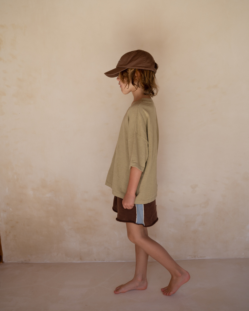 boy wearing cotton linen blend knitted shorts and t-shirt by illoura the label