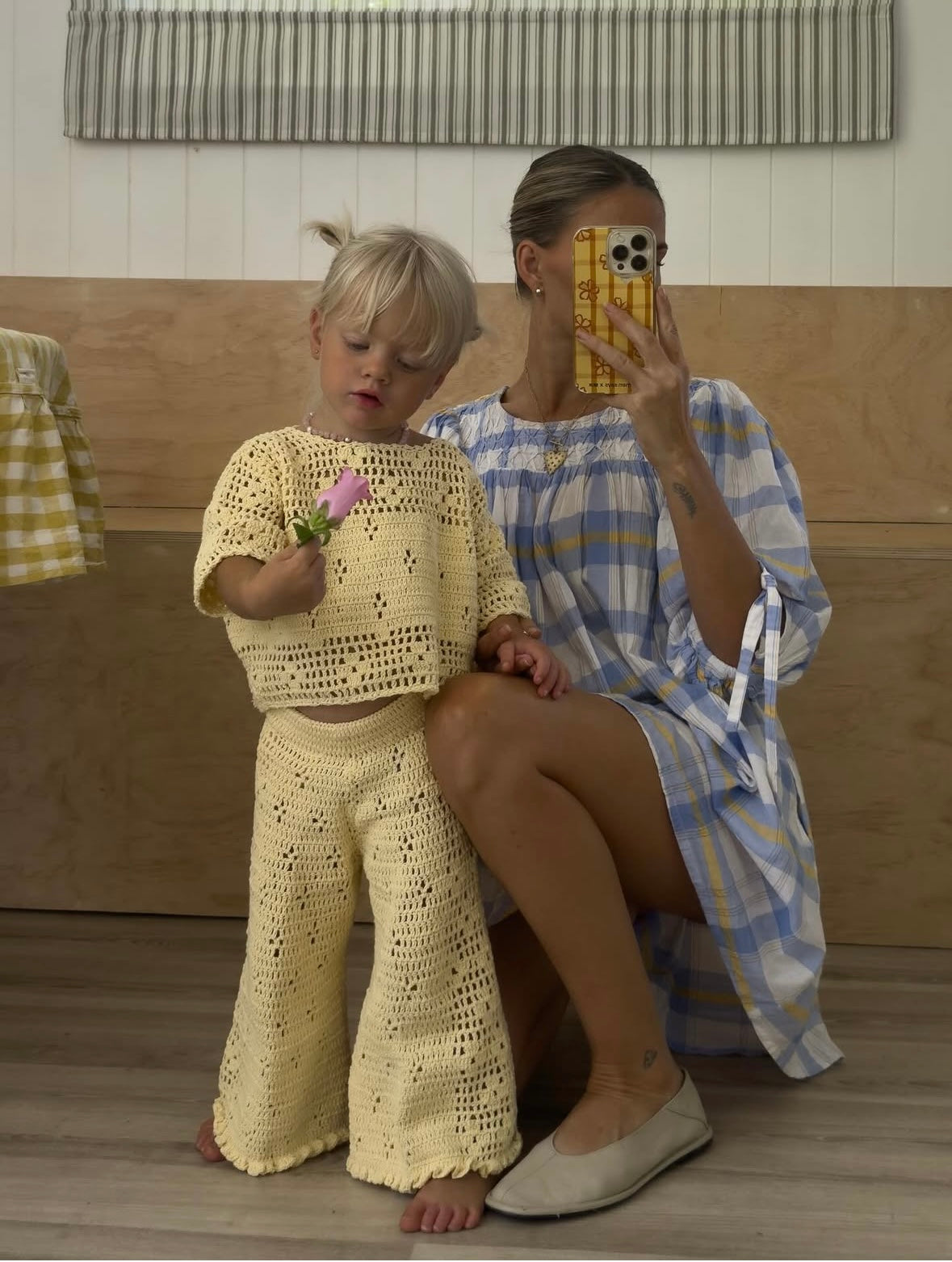 girl wearing handmade cotton crochet top and pants in butter yellow by Illoura the label