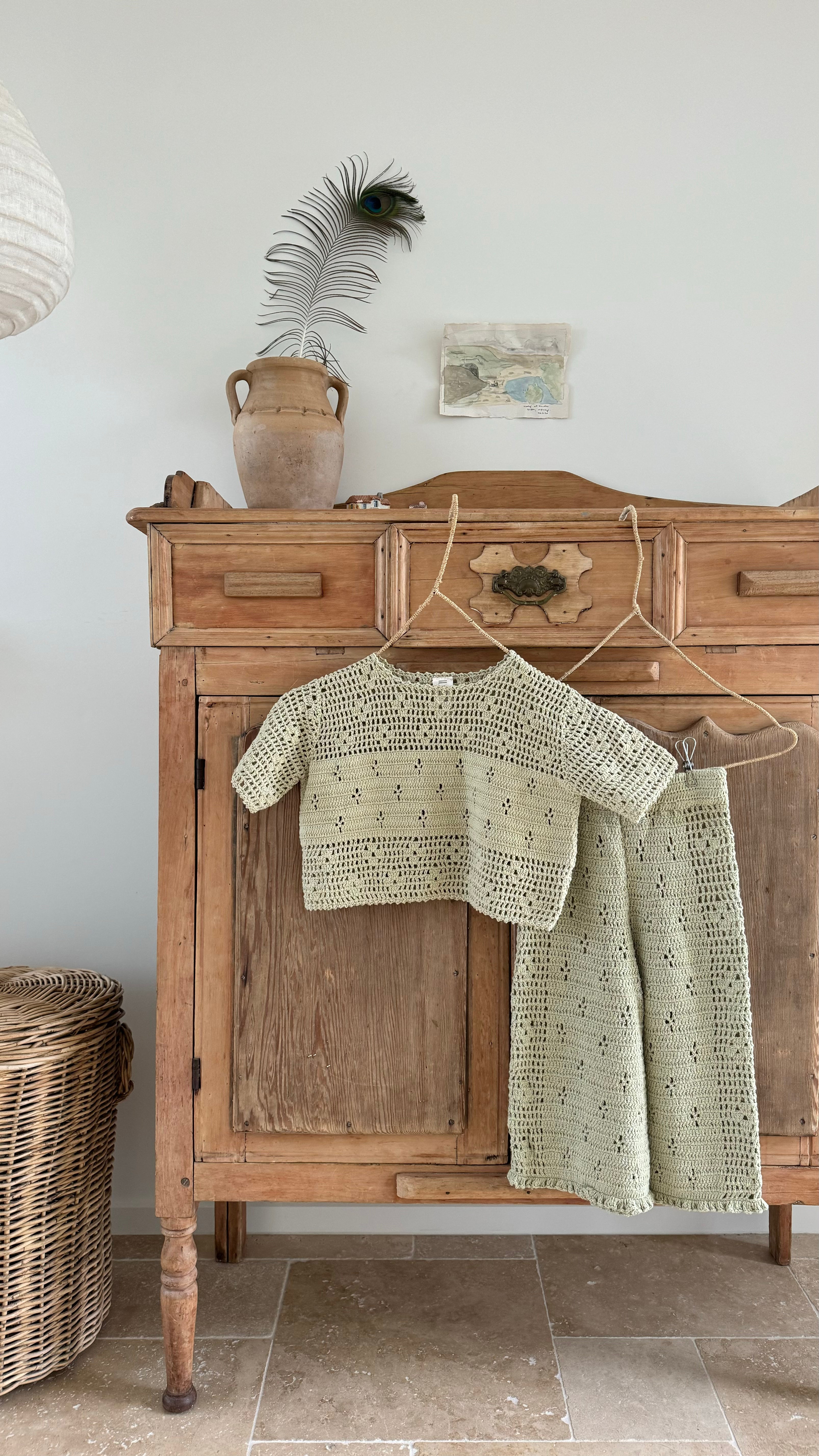 100% cotton crochet top and pants in moss colour with an elasticated waist and floral filet design throughout