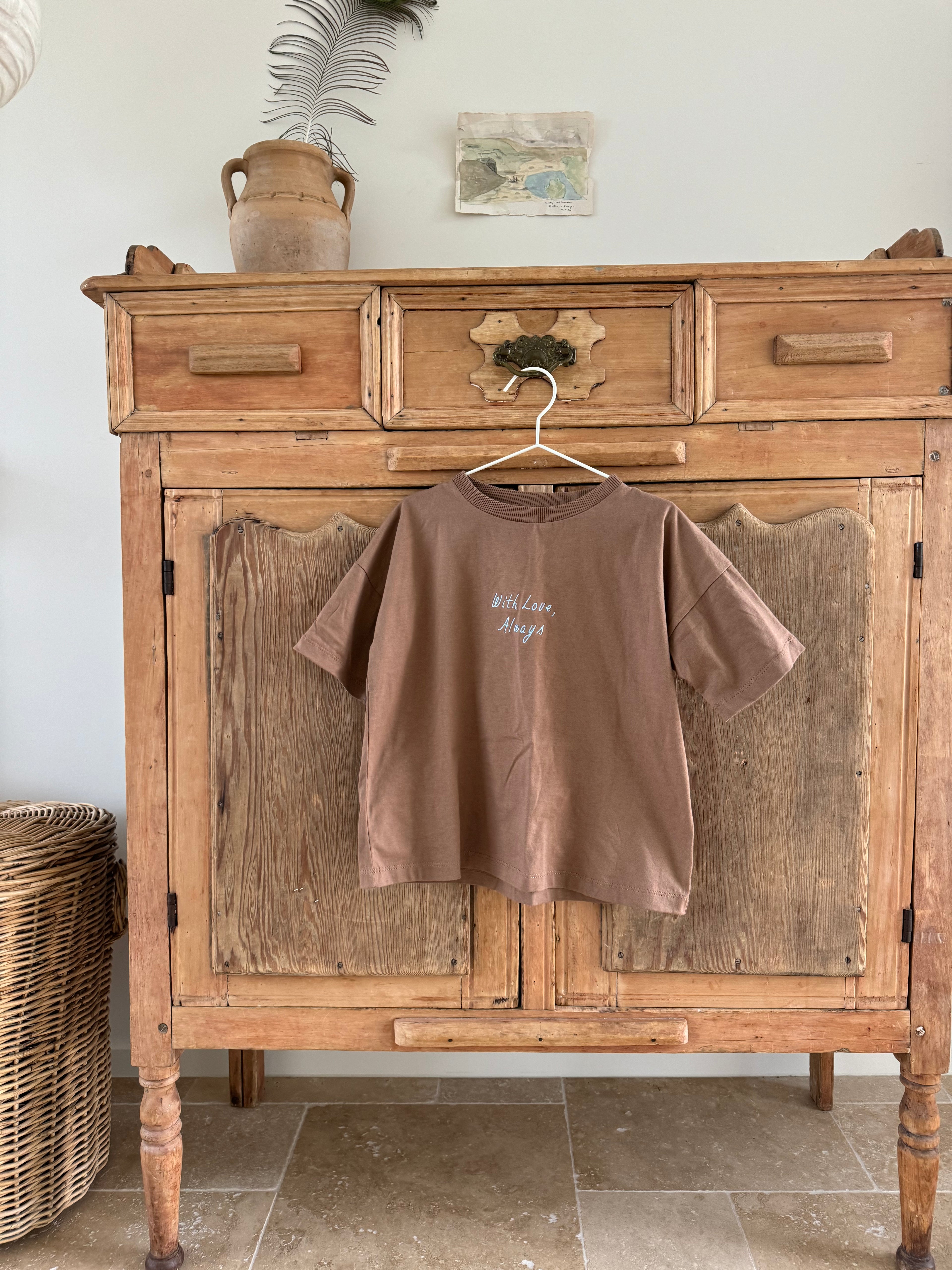 100% cotton oversized chocolate tee with blue embroidery