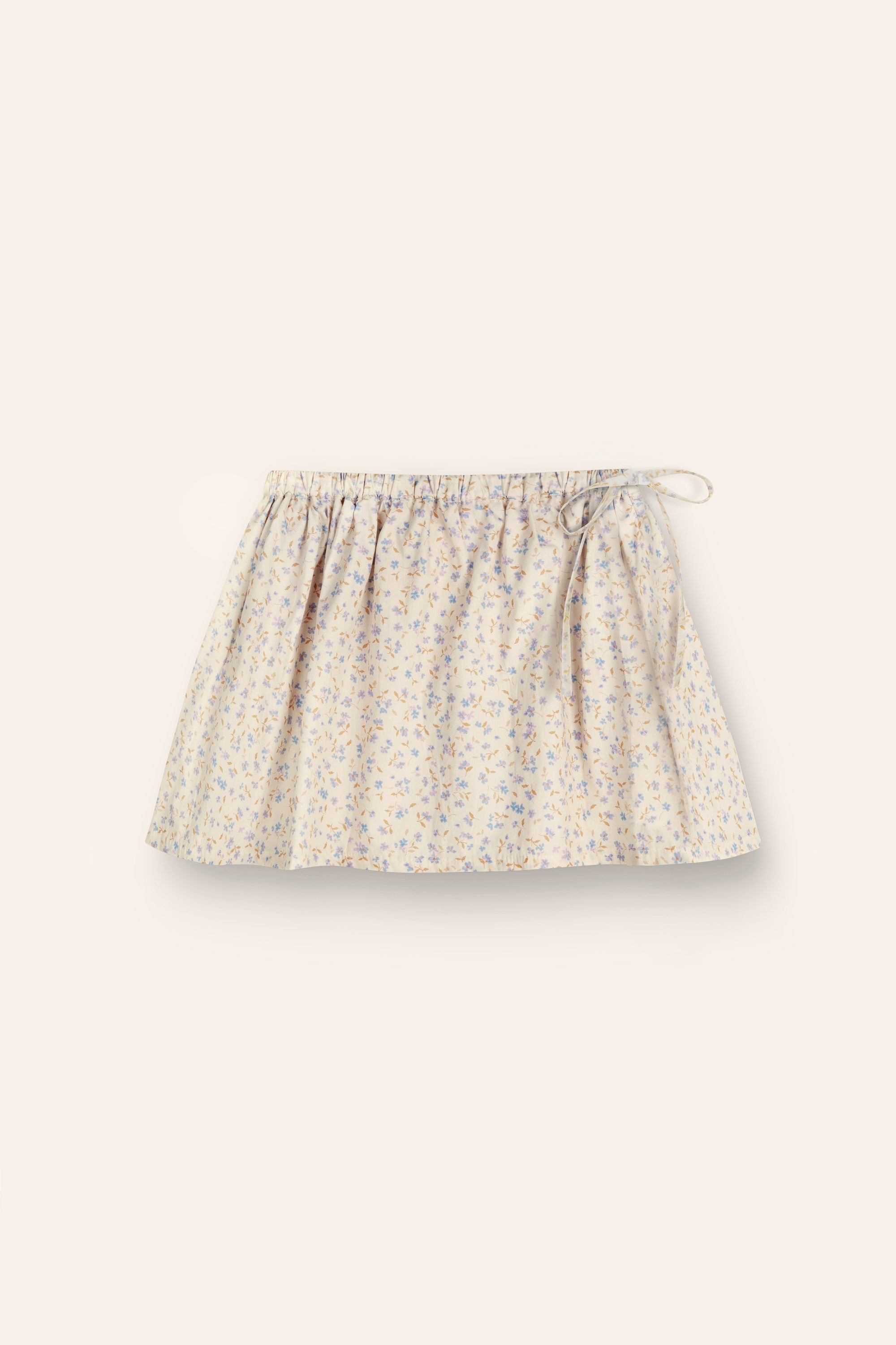 girls 100% cotton poplin skirt in a blue floral print with elasticated waist and functional tie