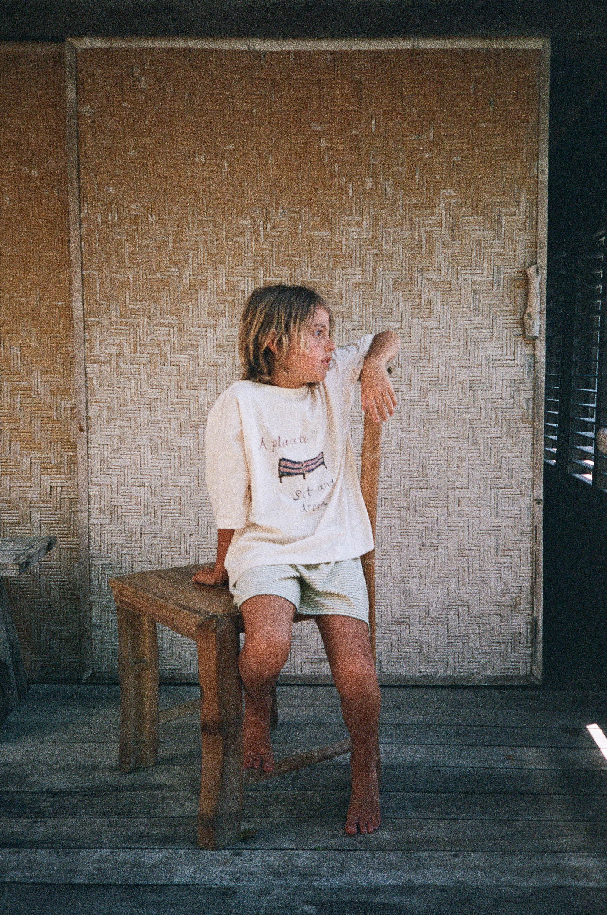 boy wearing natural cotton t-shirt and cotton jersey shorts by Illoura the label