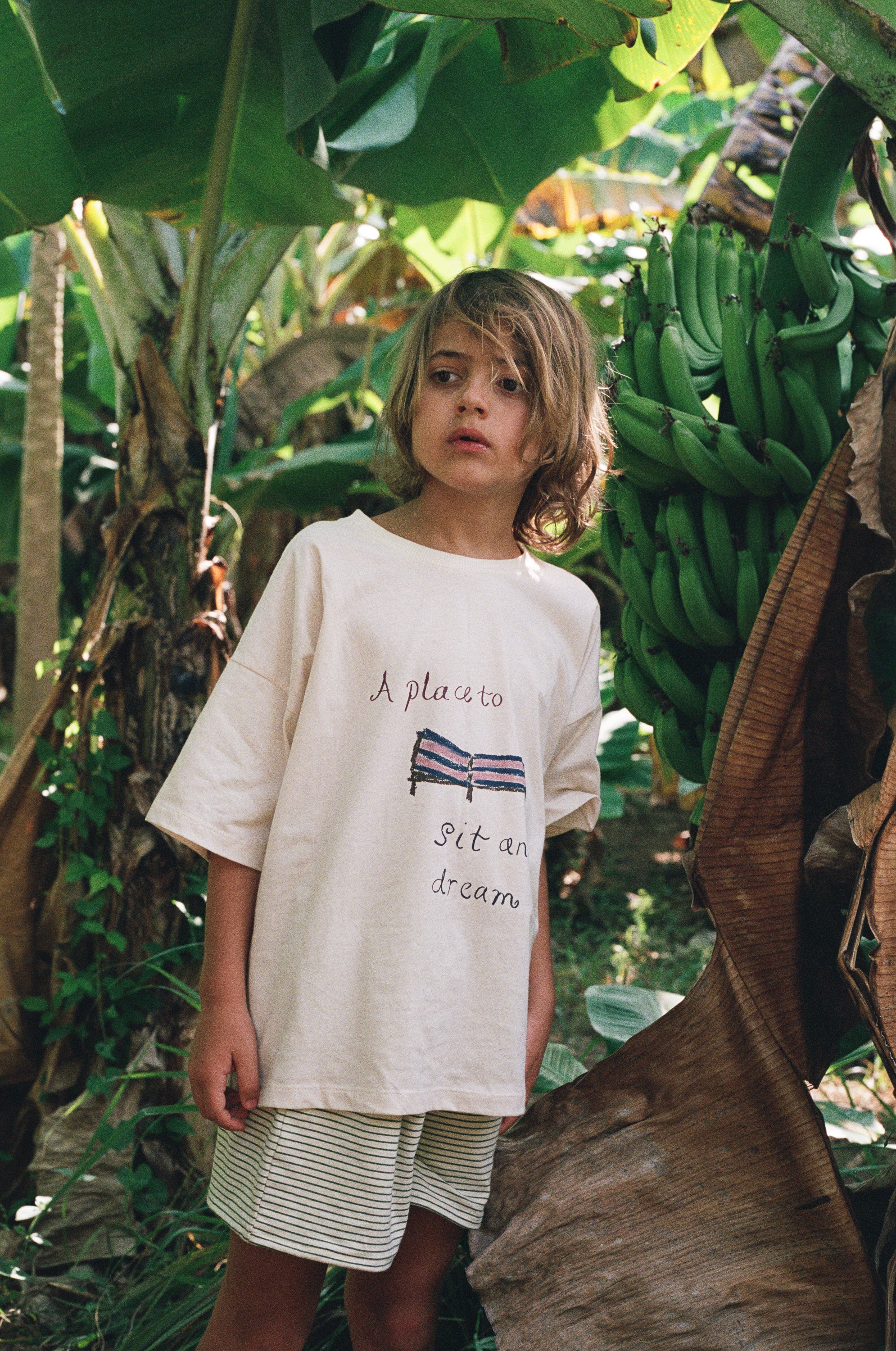 boy wearing natural cotton t-shirt and cotton jersey shorts by Illoura the label