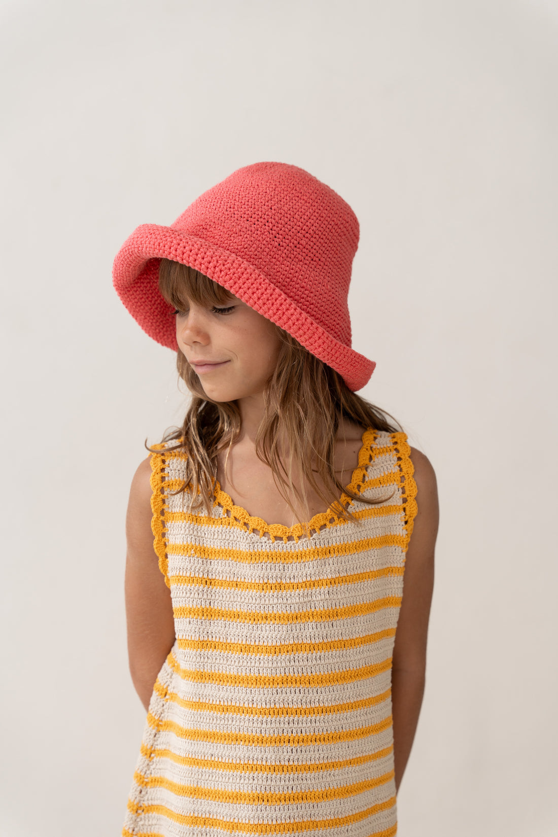 girl wearing handmade cotton crochet wide brim hat by Illoura the label