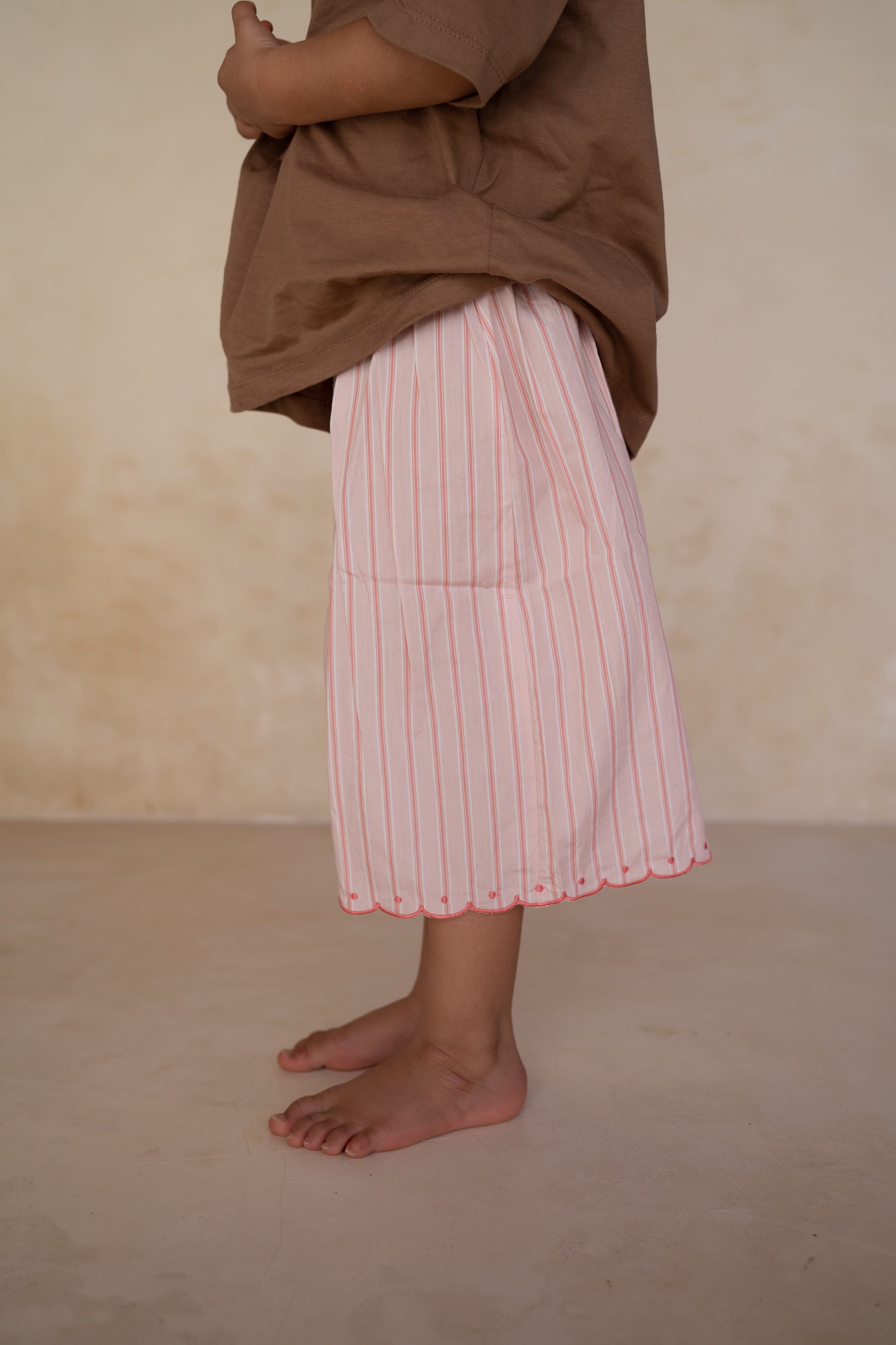 girls woven cotton wide leg pants with scalloped edging and pink stripe pattern