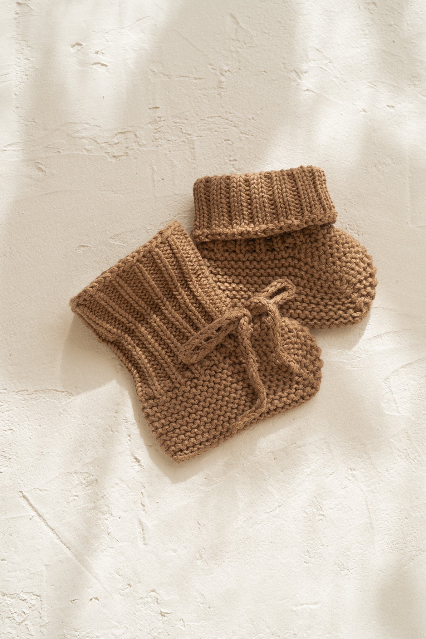 knitted cotton baby booties. Chocolate colour