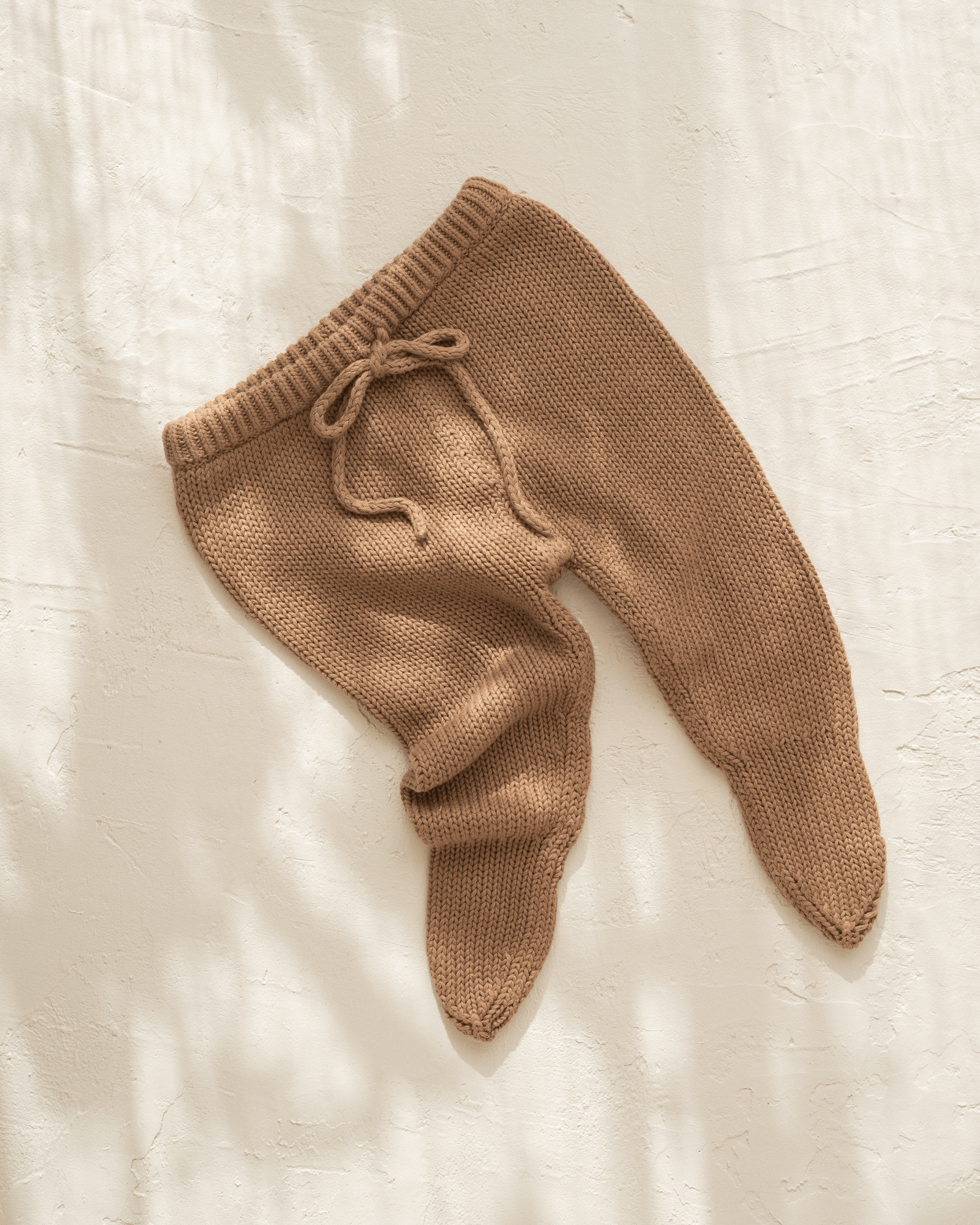 Knitted cotton baby pants. Chocolate colour