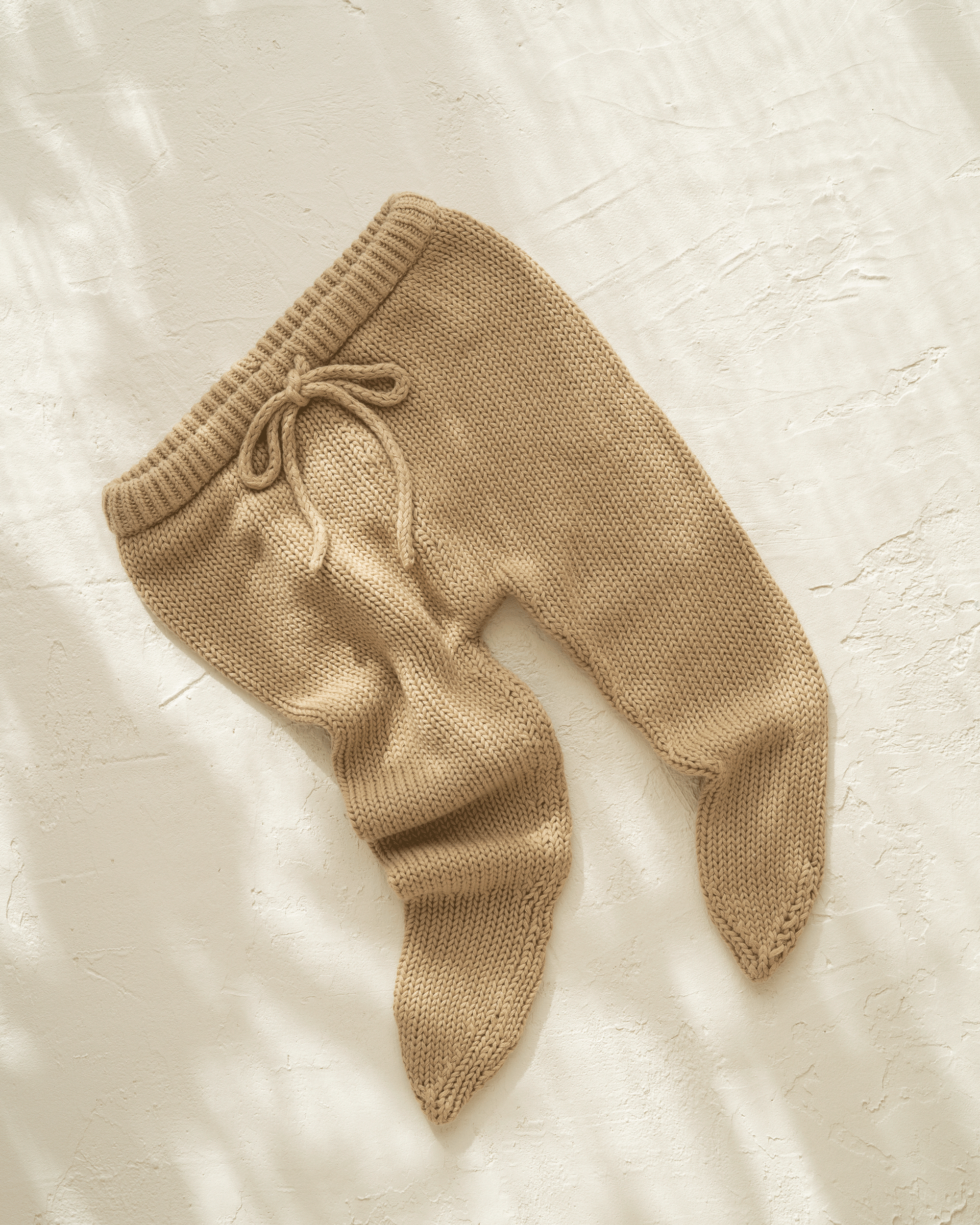 Knitted cotton baby pants. Olive colour