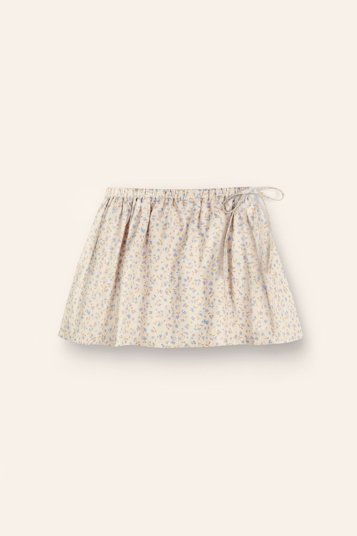 girls 100% cotton poplin skirt in a blue floral print with elasticated waist and functional tie