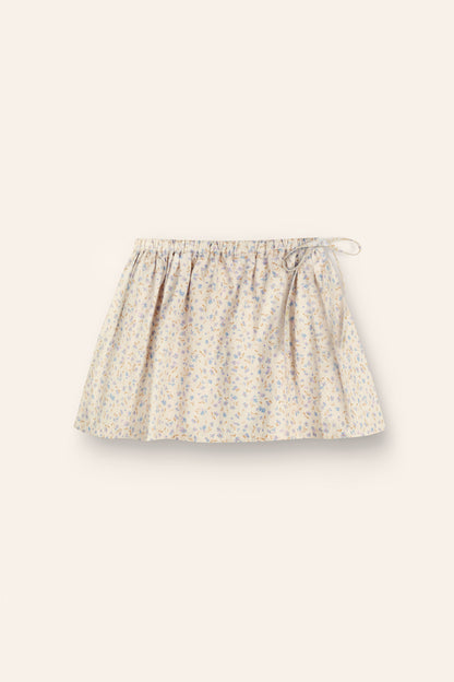 girls 100% cotton poplin skirt in a blue floral print with elasticated waist and functional tie