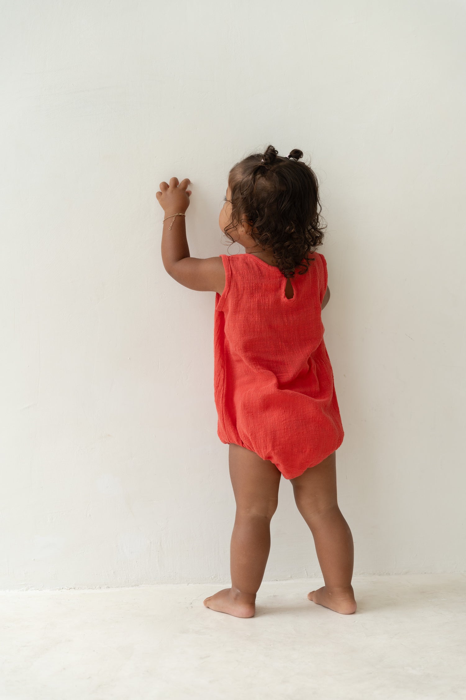 red baby romper