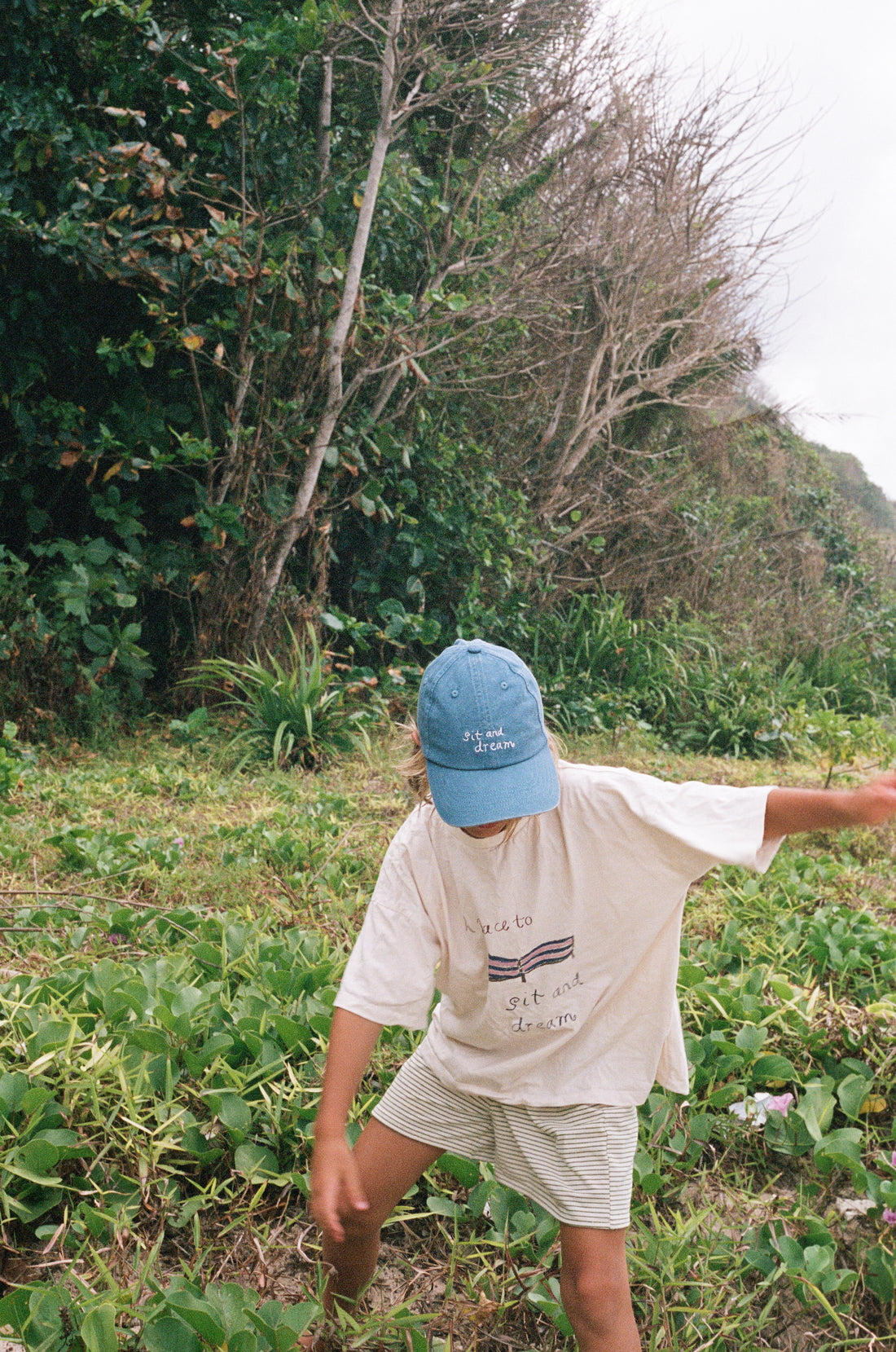 boy wearing cotton canvas cap washed blue by Illoura the label