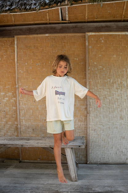 boy wearing cotton jersey stripe shorts and sit and dream t-shirt by Illoura the label