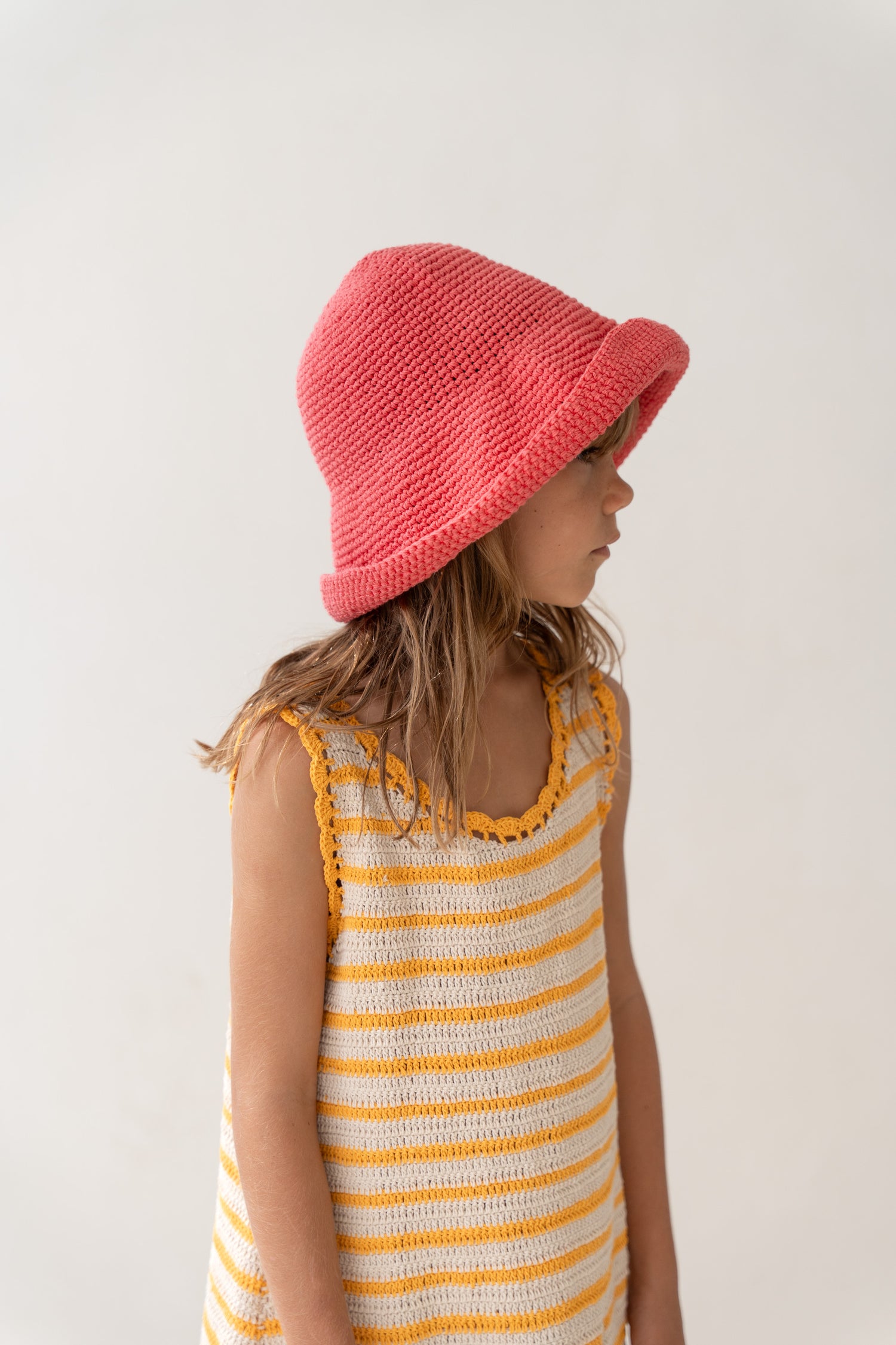 girl wearing handmade cotton crochet wide brim hat by Illoura the label