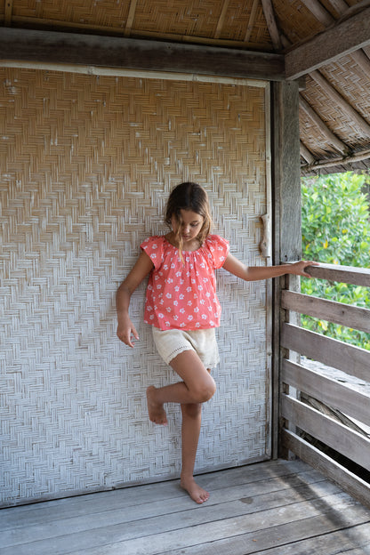 girl wearing cotton floral print blouse by Illoura the label