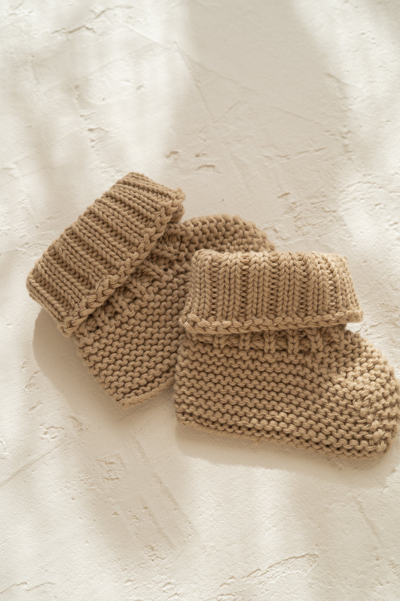 knitted cotton baby booties. Olive colour